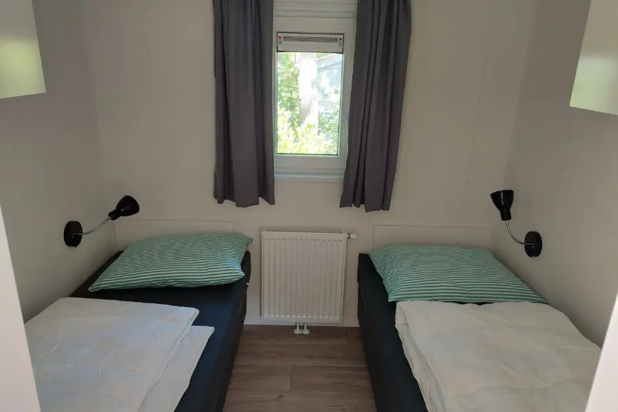 Slaapkamer 2 losse bedden