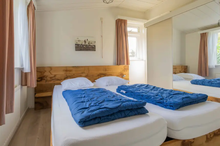 Oude Strandhuis grote slaapkamer