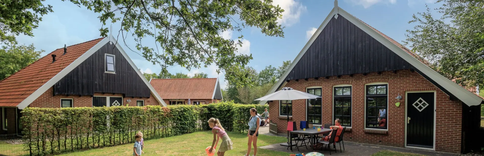 Terras kinderbungalow Boerderij Kaps