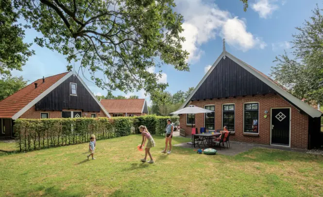 Terras kinderbungalow Boerderij Kaps
