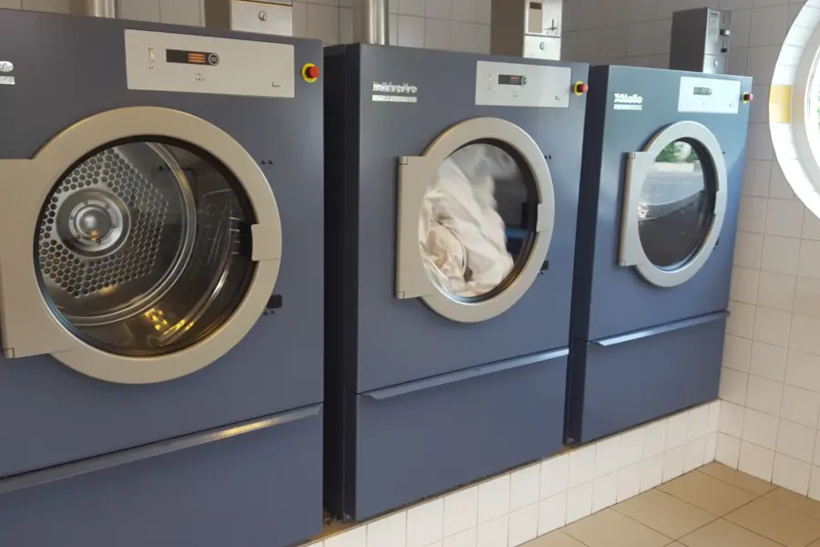 3 wasmachines op rij