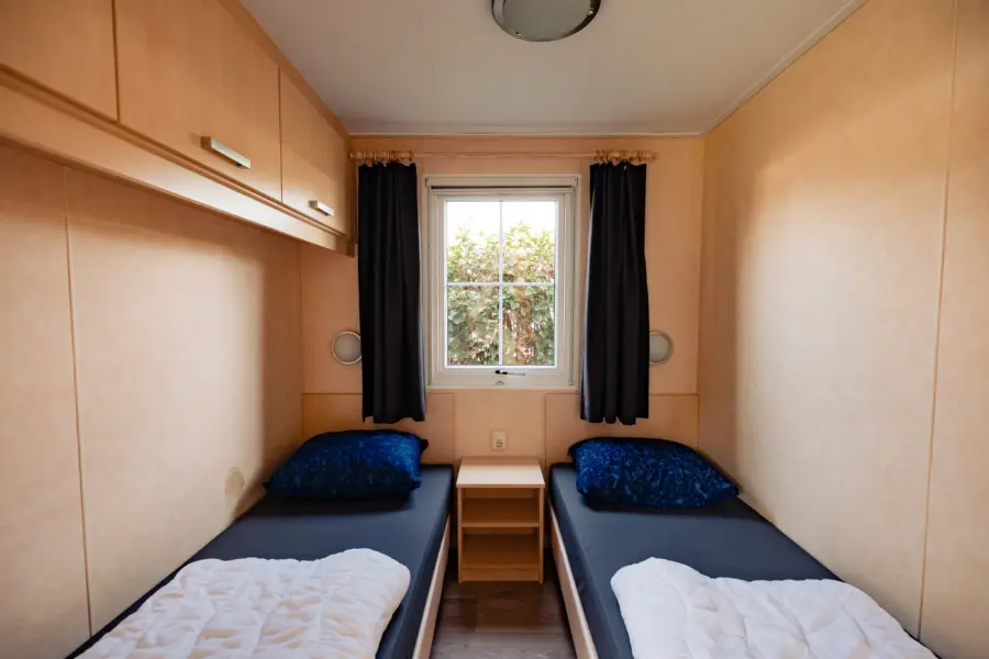 Acacia slaapkamers twee aparte bedden
