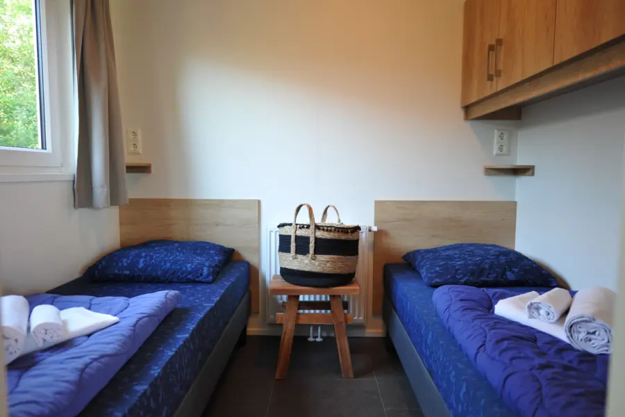Slaapkamer 2 enkele bedden 6 persoons chalet