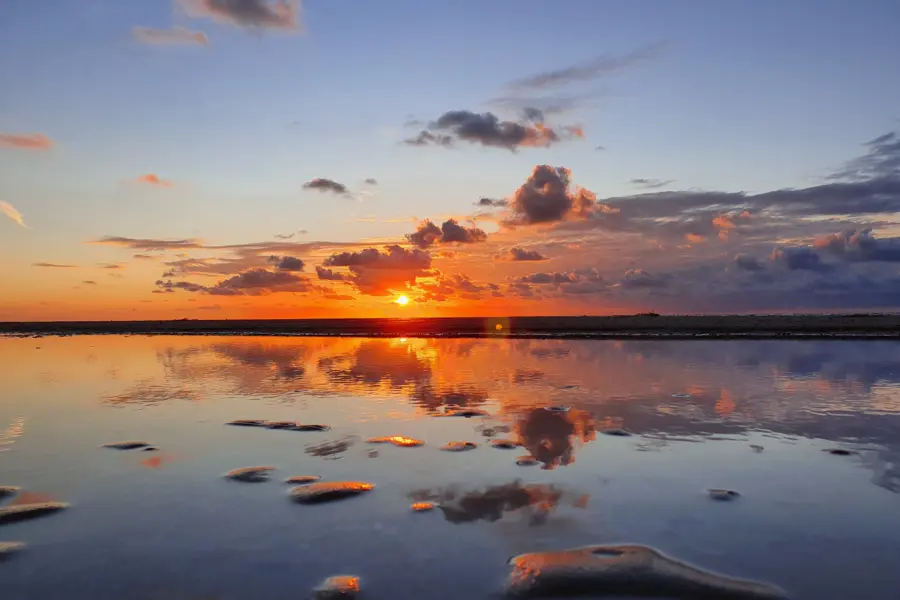 Brouwersdam strand zonsondergang