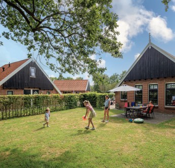 Terras kinderbungalow Boerderij Kaps