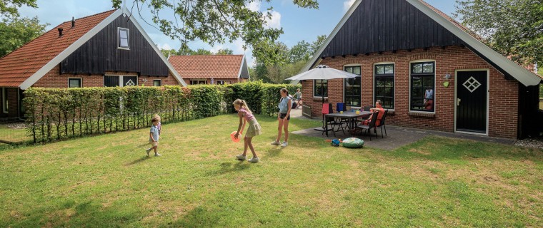 Terras kinderbungalow Boerderij Kaps